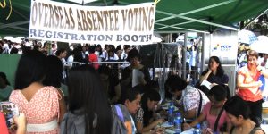 Filipinos-voting-in-Hongkong.-STANFORD.EDUabsentee_voting_registration_booth_july-20121